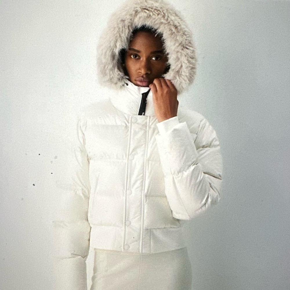 This season: New with tags Super Chalet Puff with hood-fur detaches  Never Worn